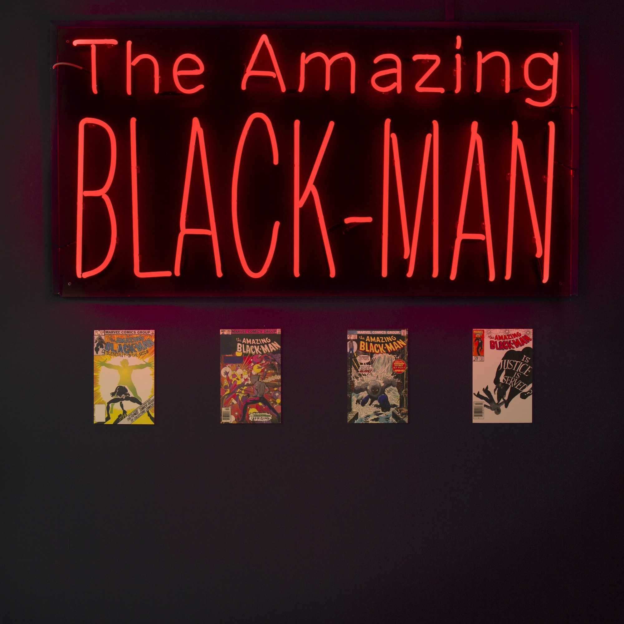 5662Kumasi J Barnett.  The Amazing Black-Man. 2018.  Neon glass.  750 x 150 cm. Installation view.