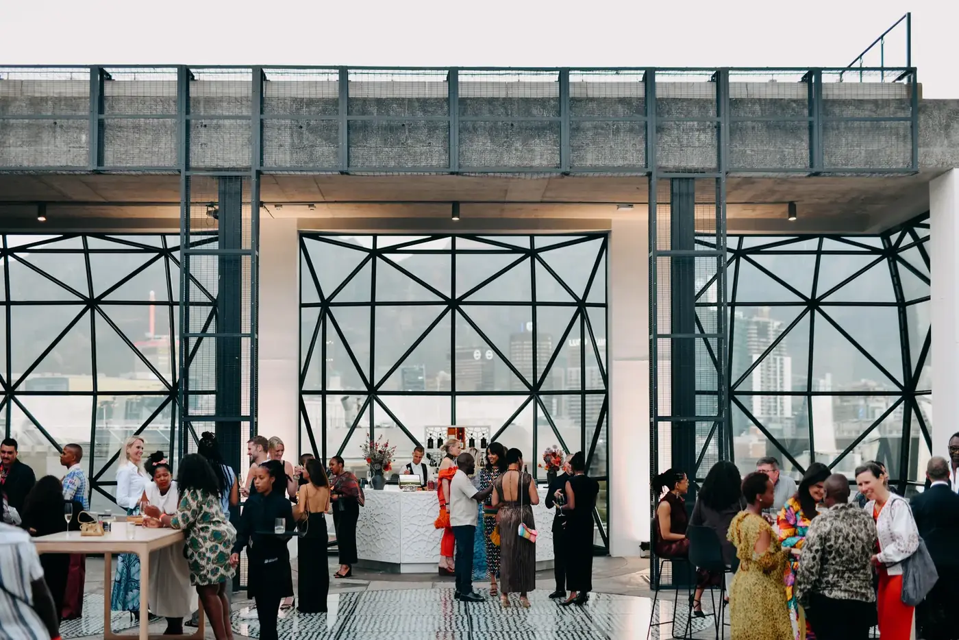 Guests gathered beneath the tall steel-framed windows of the Silo building at the Zeitz MOCAA Gala